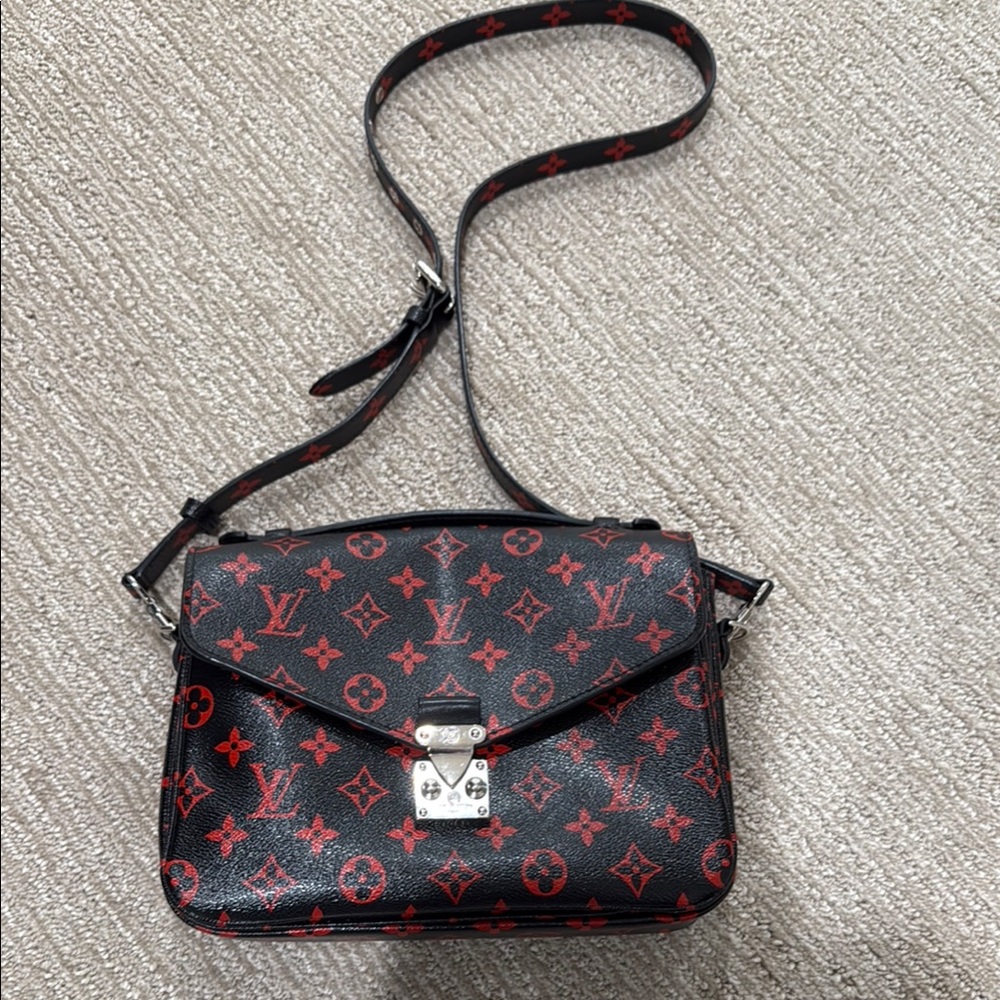 Louis Vuitton Black and Red Crossbody Bag with Monogram Design